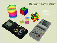 an assortment of toys including a rubik's cube, game and button board