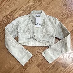 New! Zara Medium Metallic Fabric Cropped Jacket. Metal Logo Buttons, Lapel Collar, Flap Faux Pocket Detail . Gorgeous And Super Cute. Stock Pics Are For Reference Only . Zara Cropped Fitted Outerwear, Zara Fitted Cropped Outerwear, Cropped White Winter Outerwear, White Cropped Outerwear For Winter, Zara Cropped Winter Outerwear, Zara Fitted Cropped Jacket For Spring, Fitted Cropped White Outerwear, White Cropped Outerwear For Spring, Metallic Fabric