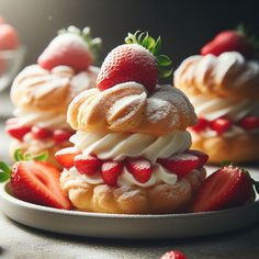 strawberry shortcakes stacked on top of each other with whipped cream and strawberries