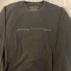 the “what am I defending now?” pullover | Taylor Swift Official Merch Taylor Swift Sweater, Folklore Merch, Hoodies Ideas, Embroidered Sweaters, Taylor Swift Folklore, Sweater Ideas, Embroidery Sweater