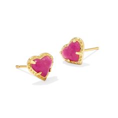 We don't know if it's just their heart shape, but we're crushing on the Anna Stud Earrings. Adorably chic, these studs are a fun and flirty take on your everyday earrings. Style as a standalone pair or wear with a bold statement earring for an always-sweet look. To preserve your fashion jewelry for years to come, agents such as soaps, perfumes, lotions, makeup, hair and cleaning products, and other chemical contact should be avoided. Take care to remove jewelry before showering, sleeping, exerci Pink Jewelry Aesthetic, Heart Stud Earrings, Statement Earring, Target Style, Pink Jewelry, Kendra Scott Jewelry, Heart Studs, Everyday Earrings, Heart Earrings Studs