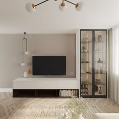 a modern living room with white furniture and wood flooring