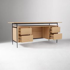 an office desk with drawers and a metal frame on the top, in front of a gray background