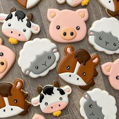 many decorated cookies with farm animals on them