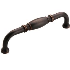 an antique style pull handle on a white background