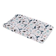 a baby's changing pad cover with dogs and stars on it