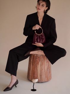 Burgundy Ring Handle Bag - Verafied New York Evening Dinner Outfit, Burgundy Ring, Ring Handle Bag, Evening Dinner, Unique Handbags, White Linen Pants, Chic Pants, Black Wool Coat, Dinner Outfit