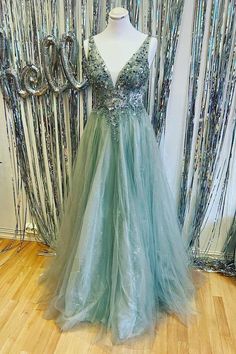 Mint Green Beaded V-Neck Backless A-Line Prom Dress Homecoming V-neck Embellished Dress, V-neck Embellished Dress For Homecoming, Green V-neck Evening Dress With Sequins, Elegant V-neck Evening Dress With Rhinestones For Prom, V-neck Embellished Dress With Fitted Bodice, Embellished V-neck Dress With Fitted Bodice, V-neck Rhinestone Dress For Prom Season, Fitted V-neck Evening Dress With Beaded Straps, V-neck Embellished Dress For Prom Season