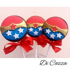 two lollipops decorated with red, white and blue stars