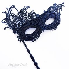 This black masquerade mask beautifully blends the allure of delicate lace with the brilliance of rhinestones, making you the star of every masquerade ball. The sparkling stones accentuate the mask's design, creating a captivating aura that commands attention. From grand masquerade balls to themed soirées and elegant celebrations, this mask is the perfect choice!


Age Group/Gender - Adult/Women

Size/Type - One size fits all adults

Mask Color - Black

Mask Material - Lace

Special Features - Sh Elegant Adjustable Masquerade Mask For Mardi Gras, Elegant Evening Mask For Carnival, Elegant Evening Masks For Carnival, Elegant Party Eye Mask, Black Adjustable Masquerade Mask For Carnival, Adjustable Black Masquerade Mask For Carnival, Elegant Black Eye Mask For Masquerade, Gothic Eye Mask For Evening Masquerade, Gothic Evening Masquerade Eye Mask