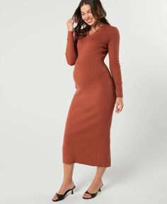 This isn't your mom's maternity dress. The Full Body Maternity & Nursing Sweater Dress will wrap you in supportive, luxurious knit, making you feel chic, feminine, and cozy all at once.he flattering v-neck and maxi length elongate and slim, while showing off your best baby assets proudly! Look party or office ready, while feeling like you're in your coziest robe all day long. Best of all, this dress keeps looking amazing long after you're done with pregnancy life. Orange Maternity Dress, Long Maternity Dress, Maternity Work Wear, Nursing Sweater, Maternity Sweater Dress, Maternity Long Dress, Petite Models, Maternity Outfit, Maternity Brands