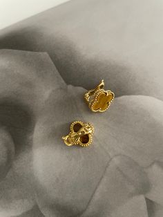 The Clover Earrings bring a classic touch of style to any look. Show off your beautiful earrings with their timeless clover design for an instantly chic style. Classic Flower Earrings, Classic Pierced Flower-shaped Earrings, Classic Pierced Flower Shaped Earrings, Elegant Gold-plated Flower Charm Earrings, Elegant Flower Charm Clip-on Earrings As Gift, Elegant Clip-on Earrings With Flower Charm, Elegant Clip-on Flower Shaped Earrings, Elegant Clip-on Flower-shaped Earrings, Classic Gold Flower Earrings For Pierced Ears