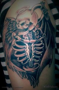 a man with a skeleton tattoo on his arm