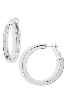 Squared edges catch the light on polished hoops that are perfect for everyday wear. 1 1/2" hoop diameter; 1/8" width Post with lever-back closure Rhodium plate or goldtone plate Imported Modern Small Hoop Hinged Earrings, Modern Small Hinged Hoop Earrings, Formal Metal Hoop Earrings With Shiny Finish, Fabric Gift Bags, Keep Jewelry, Fabric Gifts, Nordstrom Store, Free Fabric, Print Gifts