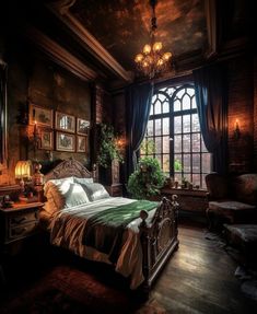 a bedroom with a large bed in front of a window and a chandelier hanging from the ceiling