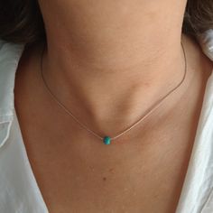 "Minimalist, wearable and delicate sterling silver necklace with turquoise beads. Length: available from 14\" (35cm) to 24\" (61cm). Width: turquoise bead 5 mm. Width 925 sterling silver chain: 0,66 mm. Strong 925 sterling silver lobster clasp. Handmade in Spain. Ideal for a gift and for combinate with other accessories. All our products are presented in a white organza bag. ♡ Made with love in Valencia ♡ ----------------------------- Discover the NICTE necklaces collection here: https://www.ets Turquoise Sterling Silver Necklace With Delicate Chain, Dainty Sterling Silver Turquoise Necklace, Dainty Turquoise Sterling Silver Necklace, Dainty Blue Turquoise Necklace In Sterling Silver, Dainty Blue Sterling Silver Turquoise Necklace, Minimalist Blue Turquoise Necklace, Minimalist Turquoise Necklace, Minimal Choker, Necklaces Collection