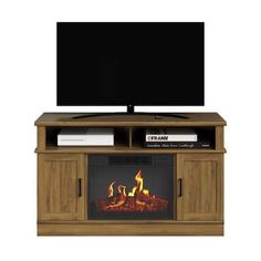 an entertainment center with a fireplace and flat screen tv