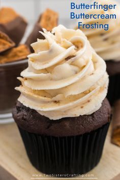 a chocolate cupcake with white frosting and cookies in the background text reads butterfingerer buttercream frosting