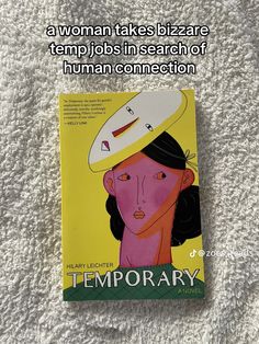 there is a book with an image of a woman wearing a hat on top of it