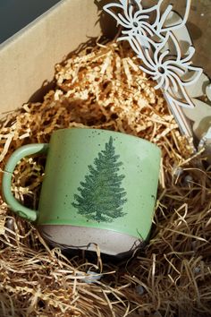 Celebrate the holiday season with our Pine Tree Pottery Mug, a perfect gift for family and friends. This charming Christmas Tree Mug features a rustic design with a minimalist tree sketch, making it a beautiful addition to any holiday collection. Crafted from high-quality pottery, this mug is not only aesthetically pleasing but also durable and practical for everyday use. Ideal for cozying up with your favorite winter beverage, this mug is a thoughtful Christmas gift for her or anyone who loves Christmas Gifts Aesthetic, Tree Pottery, Minimalist Mug, Mug Christmas Gifts, Rustic Mug, Minimalist Tree, Gifts Aesthetic, Tree Sketch, Rustic Mugs