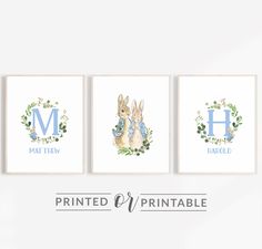 three prints with the letter h and two rabbits in wreaths on them, one is blue