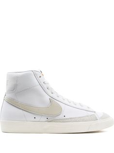 Light bone/sail white leather/rubber Blazer Mid '77 Vintage sneakers from NIKE featuring round toe, flat rubber sole, front lace-up fastening, branded insole and ankle-length. These styles are supplied by a premium sneaker marketplace. Stocking only the most sought-after footwear, they source and curate some of the most hard to find sneakers from around the world. | Nike Blazer Mid '77 Vintage sneakers Blazer Mid 77 Vintage, Blazers Shoes, Nike Blazer Mid 77, Nike Blazer Mid, Nike Blazers Mid, Vintage Sneakers, Blazer Beige, Nike T, Blazer Mid