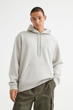 Relaxed-fit sweatshirt hoodie in cotton-blend fabric with soft  brushed inside. Jersey-lined drawstring hood  kangaroo pocket  and long sleeves. Wide ribbing at cuffs and hem. Urban Hoodie With Ribbed Cuffs And Drop Shoulder, Relaxed Fit Hooded Sweatshirt With Ribbed Cuffs, Basic Hoodie Sweatshirt With Double-lined Hood, Cotton Sweatshirt With Drawstring Hood And Drop Shoulder, Basic Sweatshirt With Double-lined Hood, Sporty Long Sleeve Hoodie With Kangaroo Pocket, Urban Style Long Sleeve French Terry Hoodie, Spring Hoodie With Pockets In Relaxed Fit, Spring Hoodie With Pockets Relaxed Fit