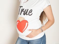 True Love maternity Shirt. Beautiful white color maternity shirt  with scoop neck and side ruched.  High quality maternity top , soft and stretchy and has a very flattering fit.   *  True maternity shirt - woman flattering sizes : S - XL *  Cotton / Lycra - supper soft and stretchy *  High quality screen print *  Scoop neck *  Side ruched *  Available in white color.  *  Natural baby  *  Short sleeves *  Easy washing in washing machine  My Sizing Tip  The shirt is stretchy to fit to pregnant wom Baby Loading, Baby Shower Shirts, Maternity Tunic, Maternity Shirt, Shower Bebe, New Mom Gift, Maternity Top, Baby Shorts, Pregnancy Shirts