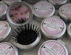 many tins with different types of hair brushes in them