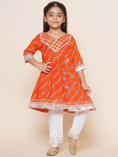 **Specifications : Please visit our brand store** https://www.etsy.com/in-en/shop/AJDezines?ref=seller-platform-mcnav Specially handcrafted clothing for the perfect look and comfort for the festive season Fabric Detail : Kurta - Cotton Blend, Pyjama - Cotton Blend Style:- Kurta Salwar Set For Kids Girls Sales Package - 1 Kurta, 1 Pyjama Kurta Feature- Cotton Blend, Round Neck, Lace Work on Front and Border, 3/4th Sleeve, Knee Length Pyjama Feature - Solid Pattern and Elasticated/Slip on Closure. Lehariya Print, Sharara Style, Cotton Sharara, Diwali Outfit, Kids Ethnic Wear, Kurta Cotton, Diwali Outfits, Kurta Sharara, Cotton Anarkali