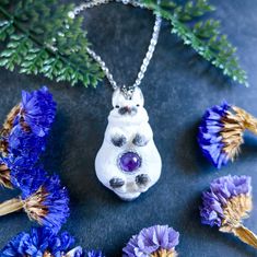 White rabbit-Bunny necklace-Hare jewelry-Forest witch gift-Mori girl-Birth stone-Cottagecore style-Magic amulet-Totem animal-Amethyst charm Made with polymer clay, natural amethyst cabachon and stainless steel findings.    Dimensions: pendant - 1.18"x1.57'' (4x2 cm) chain length - 19.69'' (50 cm) Care instructions: 1. Avoid contact with nail polish remover, white spirit and other solvents. 2. Keep away from long exposure of sunlight. 3. Do not bend, do not scratch, avoid falling from a great hei Purple Amulet Style Jewelry Gift, Purple Amulet Jewelry As Gift, Purple Amulet Jewelry As A Gift, Purple Spiritual Necklace With Large Pendant, Spiritual Purple Necklace With Large Pendant, Purple Amulet Necklaces As Gifts, Amethyst Amulet Jewelry For Gifts, Amethyst Amulet Jewelry As Gift, Spiritual Purple Pendant Necklace