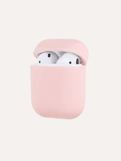 two airpods are in the pink case