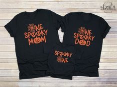 two black shirts with one spooky mom and one spooky dad on them