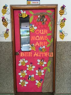 a door decorated with bees and the words, our moms are beeauiful