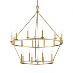 a gold chandelier with six lights hanging from the ceiling