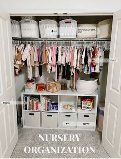 an organized nursery closet with baskets, toys and other items on the shelves for storage