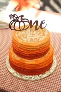 a stack of cookies sitting on top of a table next to a sign that says gone