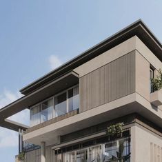 an artist's rendering of a two story building with balconies