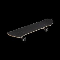 a skateboard is shown against a black background in this image, it appears to be empty