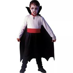 a young boy dressed in a costume for halloween