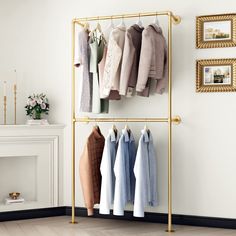 PRICES MAY VARY. Gold CLOTHING RACK:Add this pipe clothing rack into your home and clothes store.Easy to match with different styles of room so that you want to show this attractive wall clothes rack all the time. RELIEVE CLOSET PRESSURE:Not enough closet space? no!Our white pipe clothes rack can help you organize messy clothes,make your home tidy and clean,and it doesn't take much space. CONVENIENT HANGING STORAGE:This wall mounted clothing rack can be widely used in retail store,cloth boutique Free Standing Coat Rack, Metal Coat Hangers, Coat Rack With Storage, Hall Stand, Hanger Storage, Modern Entryway, Modern Style Homes, Wood Panels