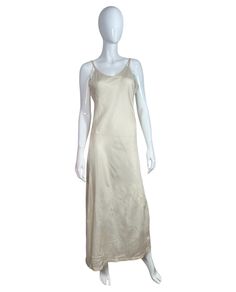 A 1930s full length slip made from a cream rayon acetate faille.  This is bias cut with a deep back and narrow straps. It doesn't have any side openings.  No labels, probably made to go under an evening or wedding gown.  Good condition, it looks very crinkled in the close ups because I gave it a wash after photos were taken, I'll press it again (as well as I can, I am not a great de-creaser!).  There are a few pinholes that can be seen when held to the light and one very small home towards the b V-neck Bias Cut Nightgown For Wedding, Elegant Bias-cut Slip Dress For Sleep, V-neck Bias Cut Wedding Nightgown, Sleeveless Bias-cut Nightgown, Women's Nightgowns, Pajama Robe, Hip Length, Night Gown, Full Length