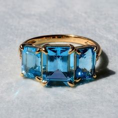 14K Solid Gold or Sterling Silver 1 Piece 7 x 9 mm and 2 Pieces 5 x 7 mm Topaz｜Swiss-Blue｜Emerald-Cut｜Eye Clean Topaz CTW: 6.00 Diamond Grade: G Color｜VS Clarity Diamond CTW: 0.03 Diamond Three Stone Ring, Star Night, Solid Gold Band, Blue Stones, Three Stone Ring, Night Blue, Swiss Blue Topaz, Ring Metal, Three Stone Rings