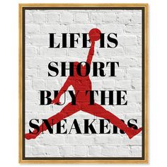 a poster with the words life is short by the sneakers on it in black and red