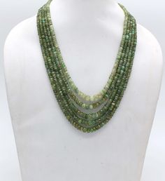 AAA Quality Natural Faceted Heishi 5 Strand Emerald Necklace With Adjustable Tassel Cord(Sarafa), 5 Strand Necklace, Natural Emerald Necklace, 18 Inch Long Specifics: Material : Gemstone Length: 18 Inch Necklace Stone :  Natural Emerald Gemstone Stone Size :  5.5 mm X 6.9 mm -- 7.8 mm X 9.6 mm Style:  Faceted Beaded Necklace Color: Green We deal in all kind of semi precious,precious beads ,Gemstones and Jewelry (in every shape and size ) as per demand. Here, you get a direct access to an exclusi Necklace Emerald, Gold Jewelry Earrings, Precious Beads, Emerald Necklace, Gold Necklace Designs, Wedding Jewellery Necklace, Emerald Gemstone, Natural Emerald, Strand Necklace