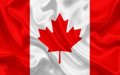 the flag of canada is waving in the wind with silky folds and colors red, white, and blue