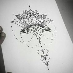 a drawing of a flower on paper