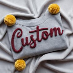 CUSTOM Personalized YARN EMBROIDERED Sweatshirt, Chenille Yarn Team Game Day Gear Apparel Fuzzy Letters Customized Team Spirit Shirts IMPORTANT: If you are looking for a Tshirt (instead of a sweatshirt or hoodie) like this, follow this link to our other listing: https://sublimationblanksnet.etsy.com/listing/1779458399/custom-personalized-yarn-embroidered Personally Design, Digitized and Stitched out by Us. Yarn Color Options are available in the description images.  If your color is not listed.. Embroidered Team Sweatshirt, Fil Chenille, Team Spirit Shirts, Custom Embroidered Sweatshirt, Gifts For Tech Lovers, Social Worker Gifts, Sports Decor, Crafter Gift, Sibling Gifts