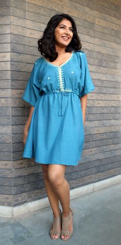 "Boho dress for women, Turquoise linen dress, Bohemian dress, Linen kaftan, Made to order, Custom made, Plus size -Model height: 5'3\" wearing size S -Length: 34\" neckline has sequins work inspired by motif of Mughal art and embroidery. This kind of embroidery is called maggam. **Note: Free Shipping time 15-21 days. Express Shipping time 5-7 days.**" Green Boho Tunic Dress, Summer Tunic Dress With Back Tassel Tie-up, Bohemian Linen Mini Dress, Green Linen Bohemian Dress, Blue Bohemian Linen Dress For Summer, Bohemian Green Linen Dress For Vacation, Green Bohemian Linen Dress For Vacation, Green Bohemian Linen Vacation Dress, Turquoise Short Sleeve Beach Dress