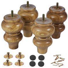 four wooden knobs and screws are shown in this image